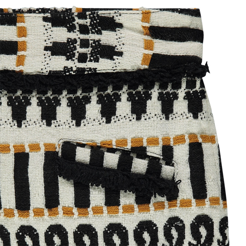 Jupe courte avec motif jacquard et franges 