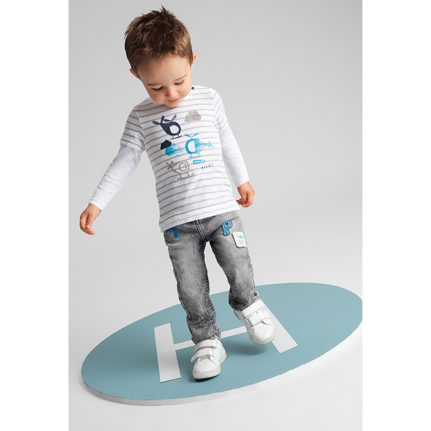 Jeans effet neige used avec badges et prints 