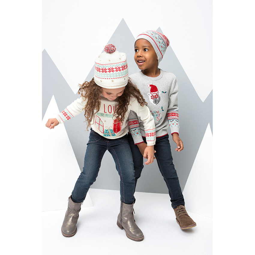 Bonnet en tricot avec motif jacquard et pompon 