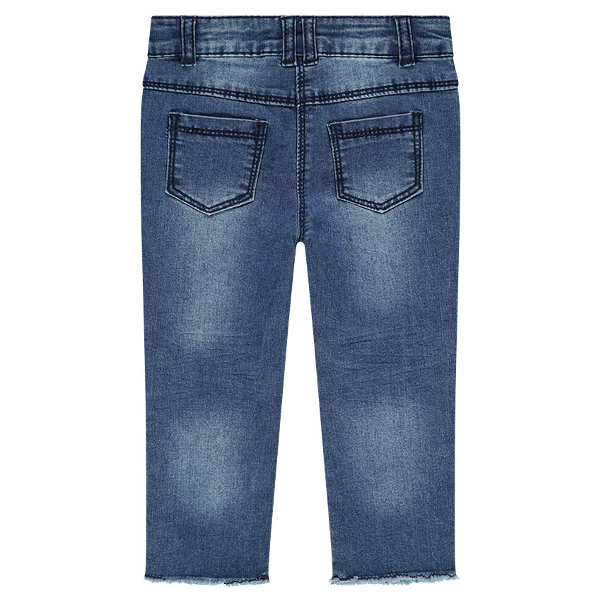 Jeans effet used avec badges Smiley 