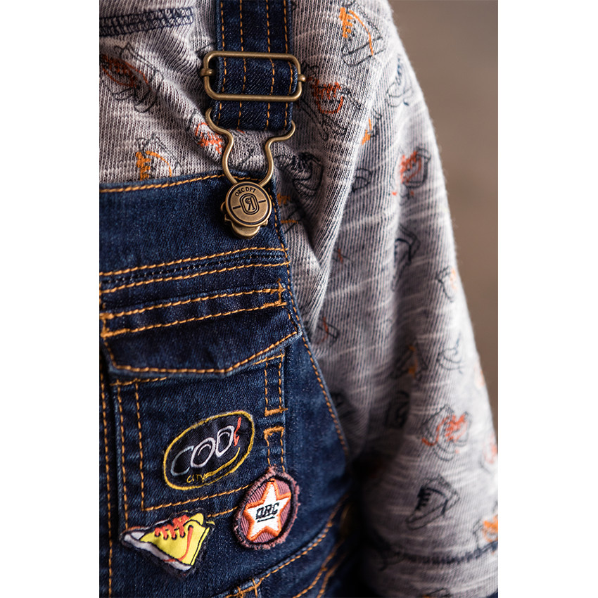 Salopette coupe skinny effet used avec badges 