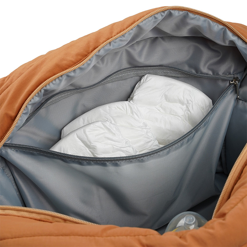 Sac à langer matelassé avec tapis Pluméa ocre 