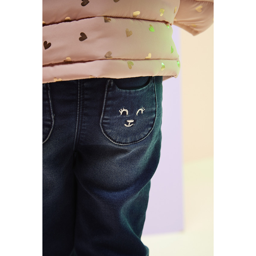 Jean effet délavé à poches arrières forme chat pour bébé fille 