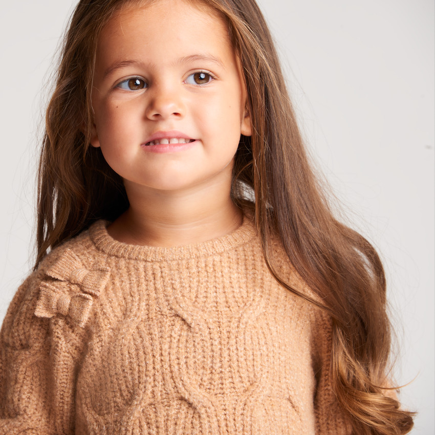 Robe bébé fille en tricot torsadé avec nœuds 