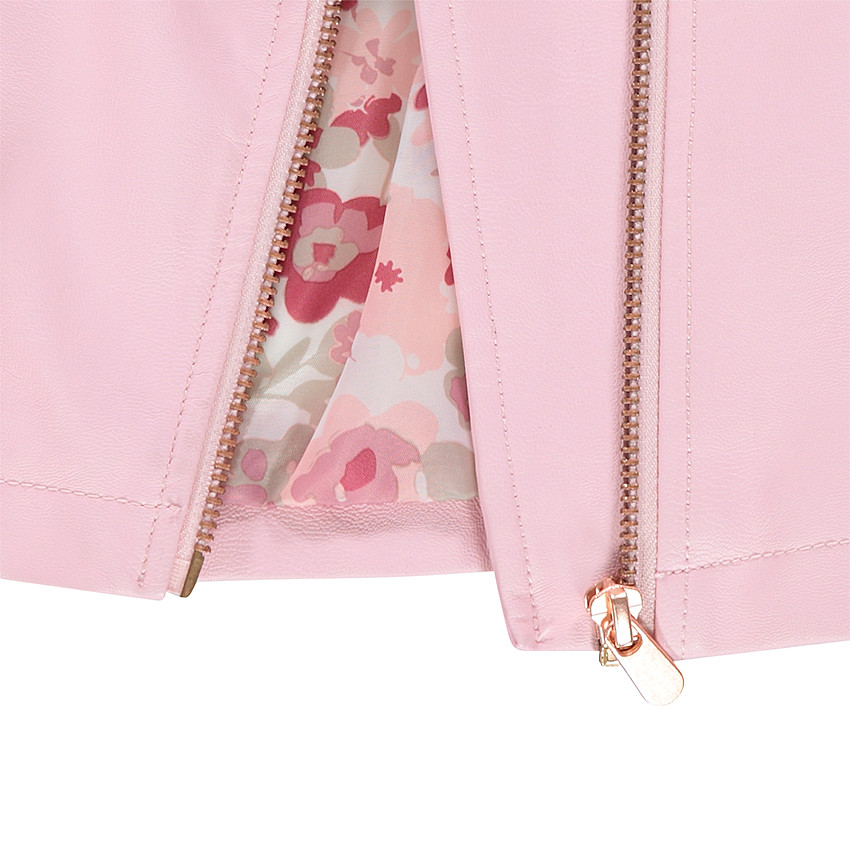 Perfecto en simili cuir rose avec poches zippées 