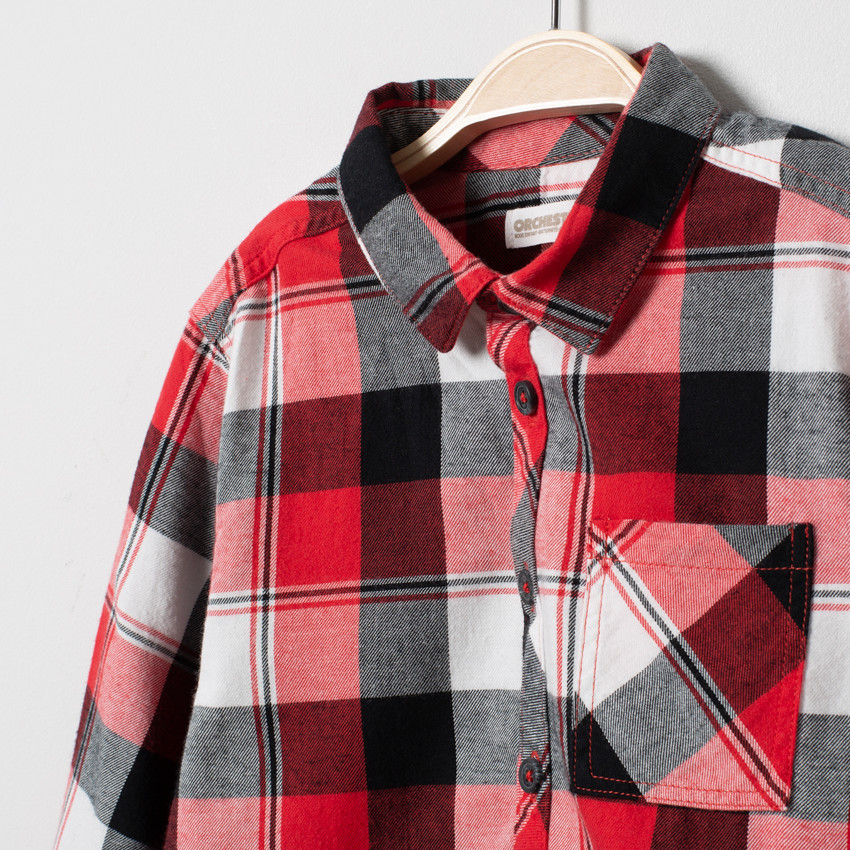 Chemise manches longues à carreaux et poche 