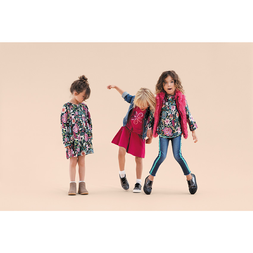 Jean effet used et crinkle à bandes appliquées 