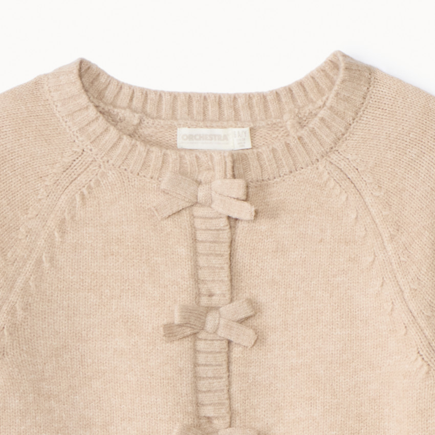 Gilet en tricot pressionné à nœuds pour fille 