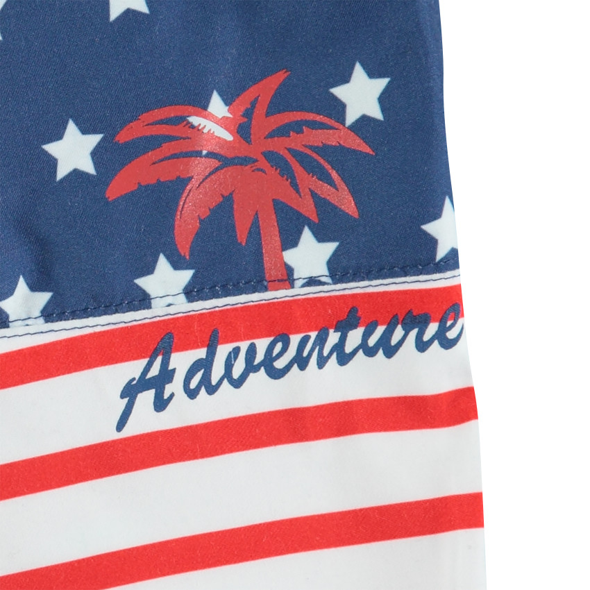 Short de bain effet drapeau avec print palmier et inscription 