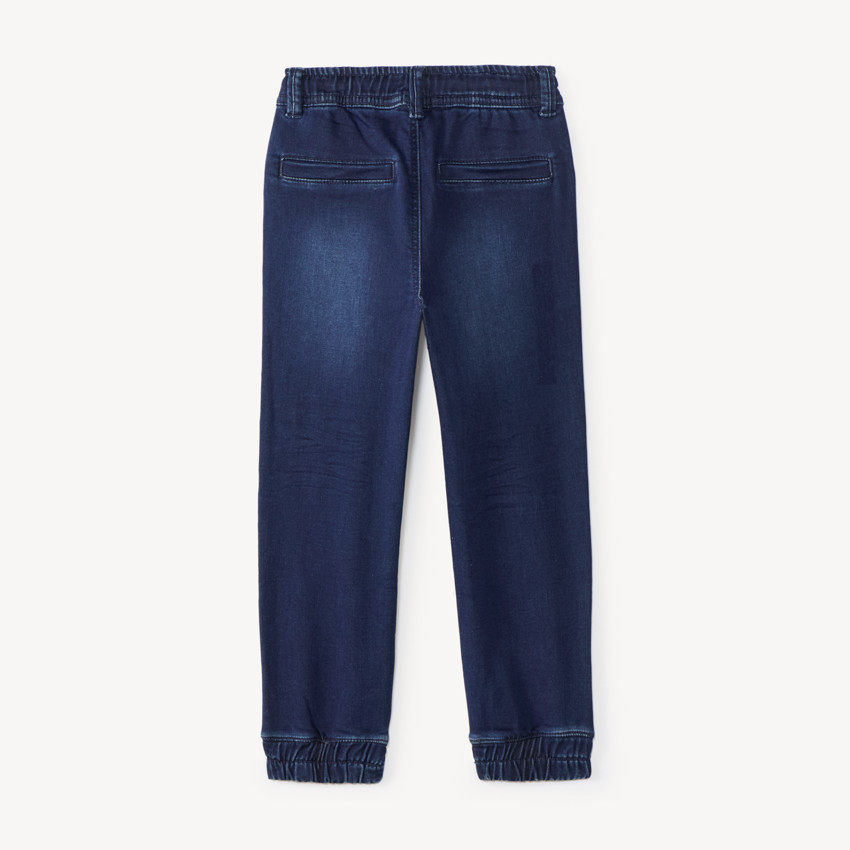 Jean style jogger en denim avec ceinture et chevilles rib pour garçon 