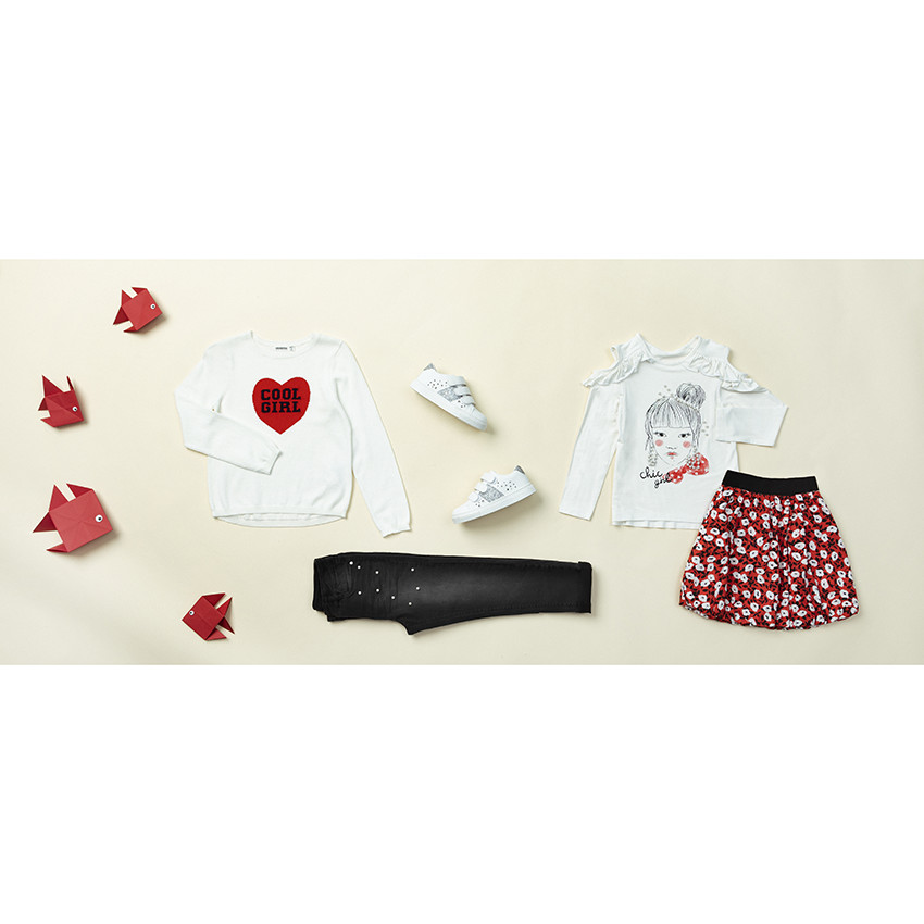 Jean slim effet used à perles fantaisie 