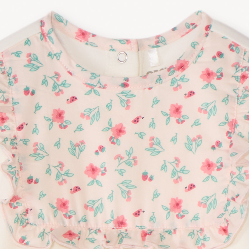 Dors-bien interlock avec plastron fleuri pour bébé fille 