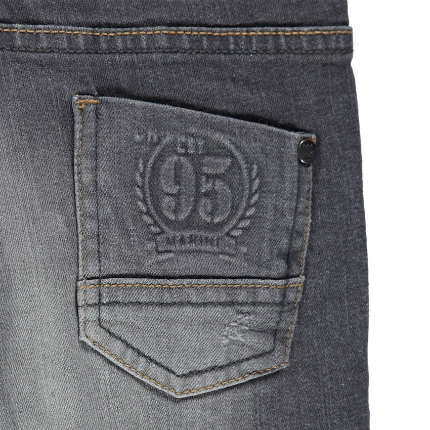 Jeans coupe slim effet used avec usures fantaisie 
