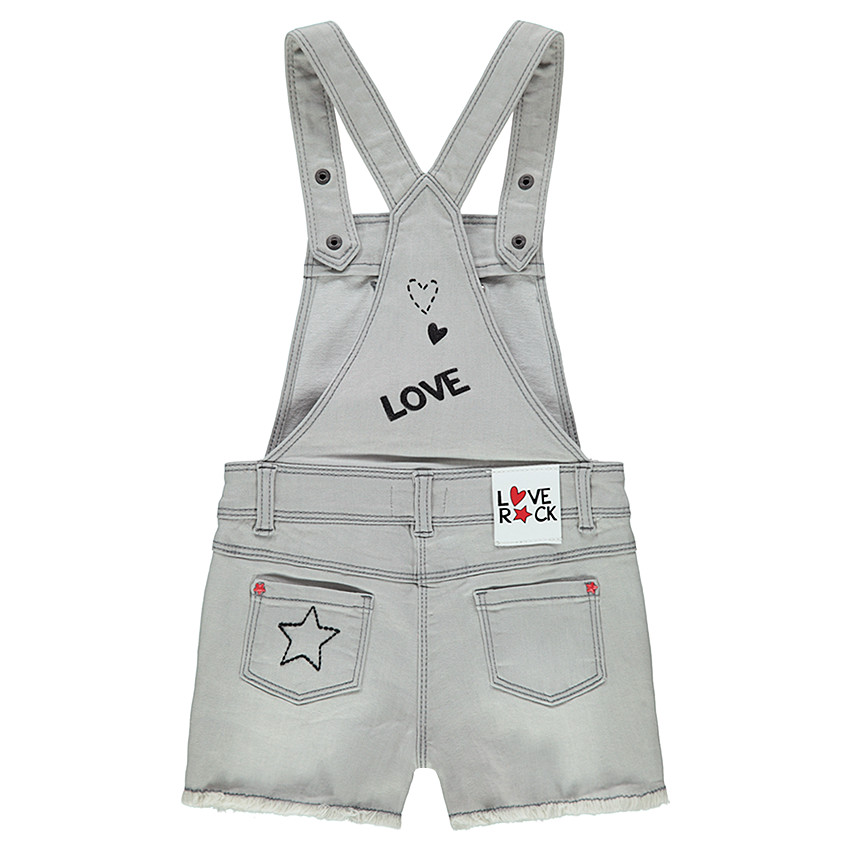 Salopette courte en jeans effet used avec broderies style rock 
