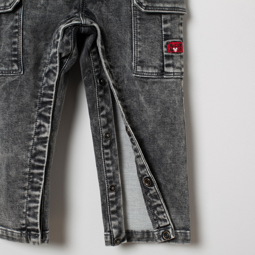 Salopette en jean effet used doublée motif Mickey Disney 