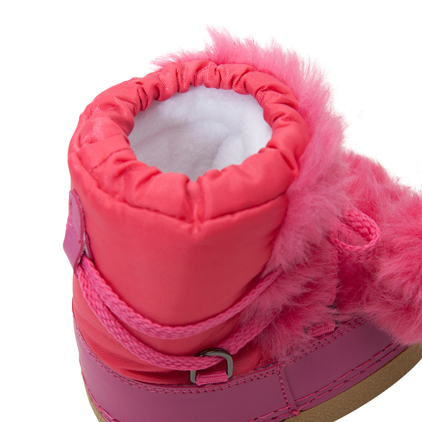 Après-ski coloris fluo à laçage et fausse fourrure 