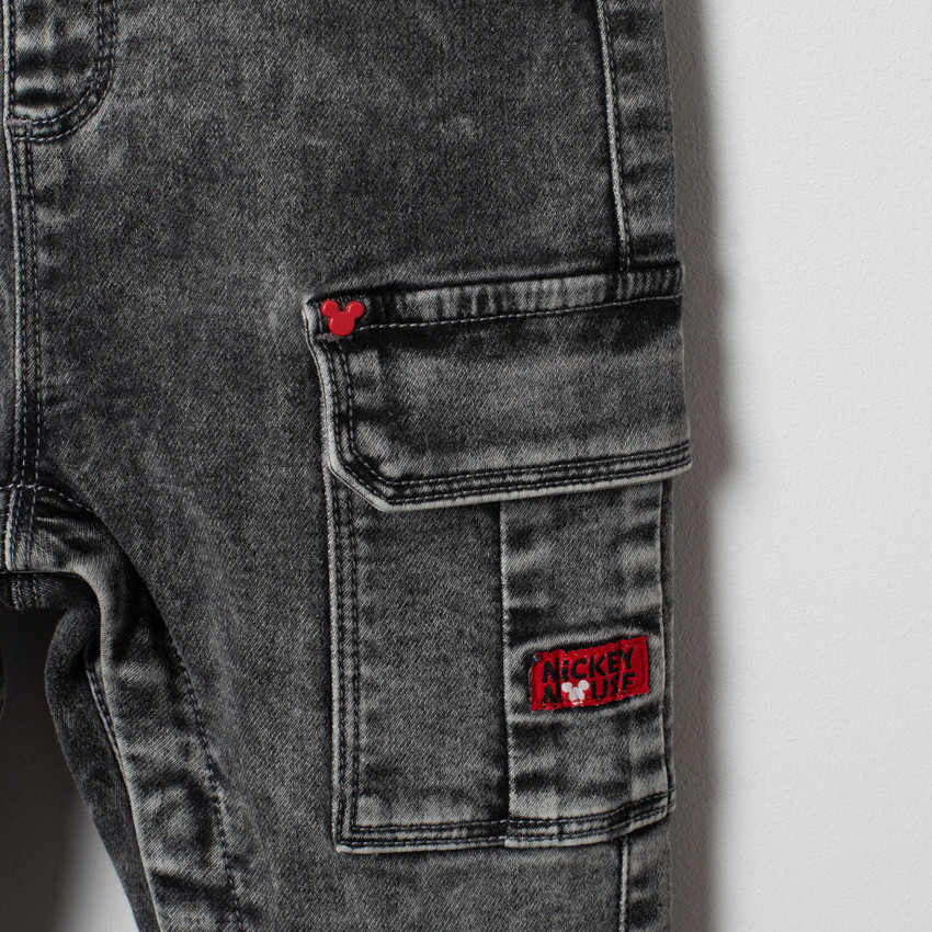 Salopette en jean effet used doublée motif Mickey Disney 