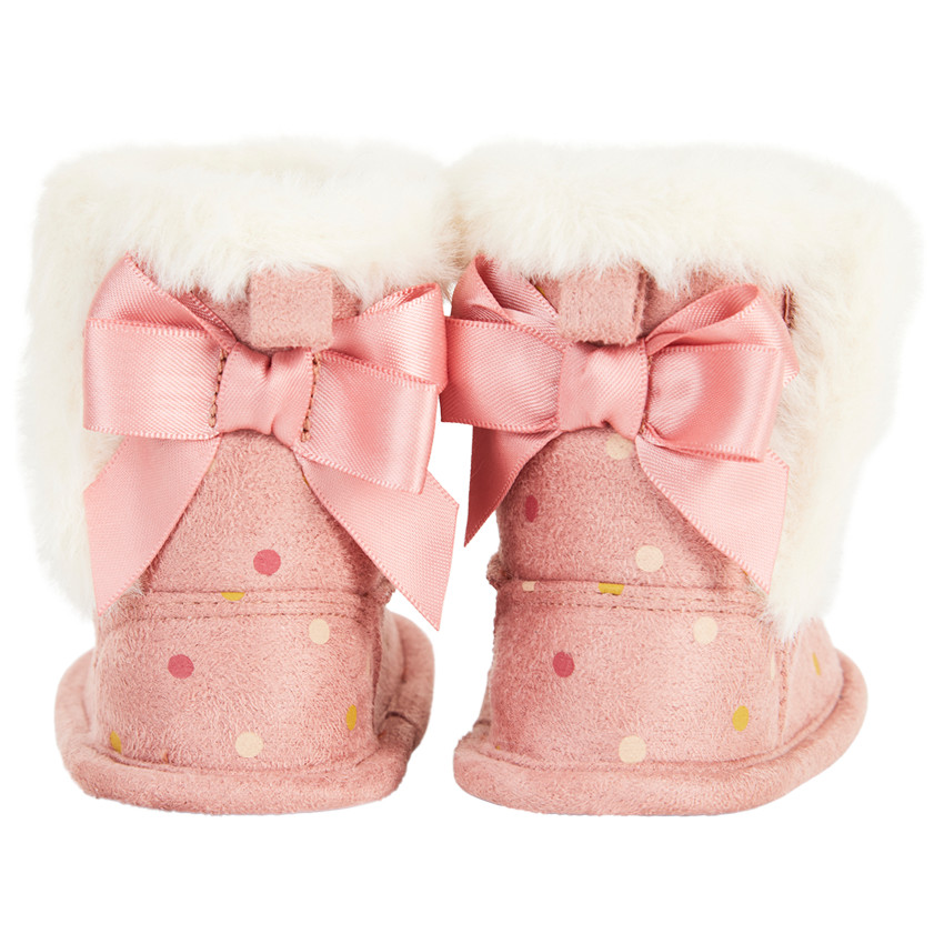 Bottines souples à fausse fourrure et imprimé pois pour bébé fille 