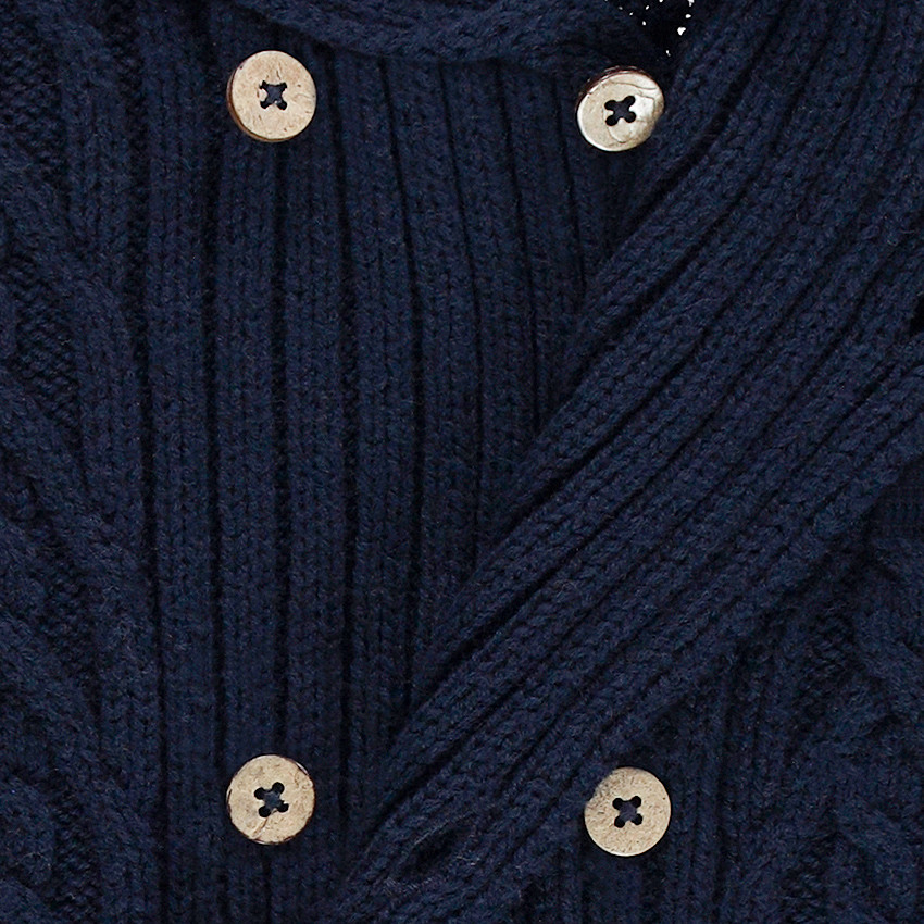 Gilet en tricot avec jeu de mailles et col roulé 
