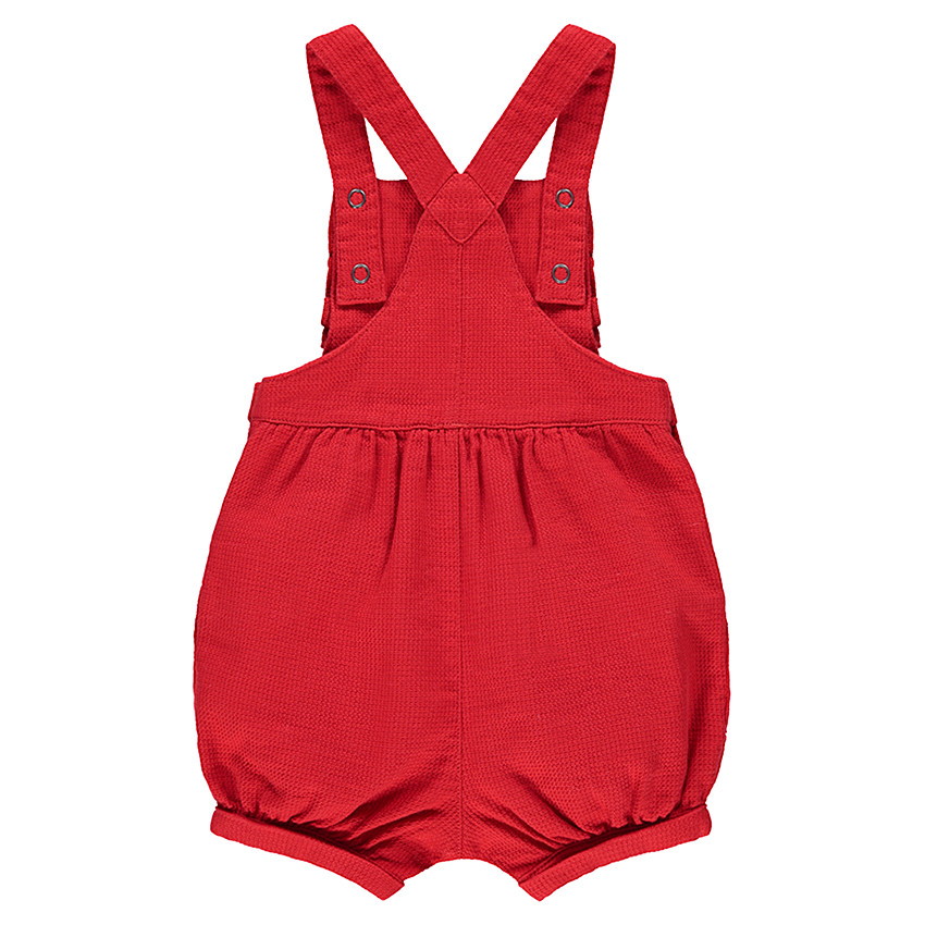 Salopette rouge forme boule avec badges patchés et volants 