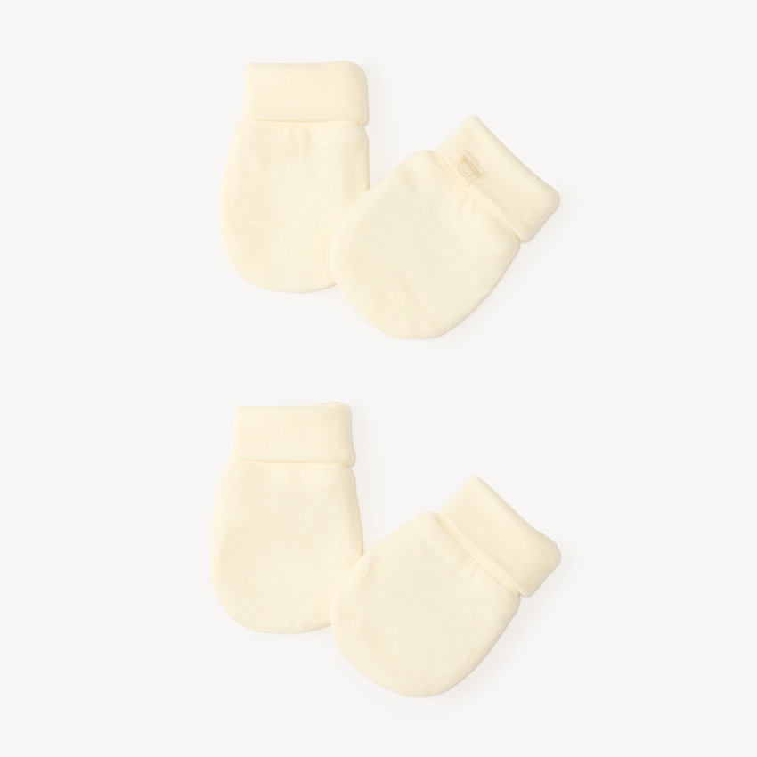 Paire de moufles unies pour bébé 