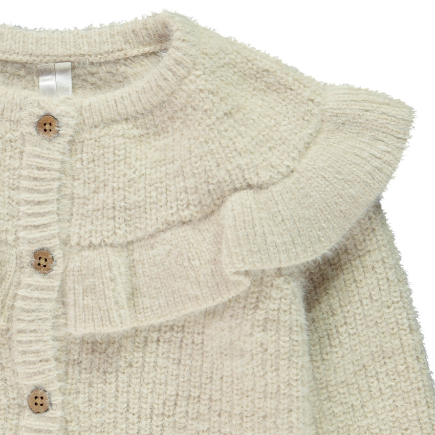 Gilet uni en tricot avec empiècement volanté pour bébé fille 