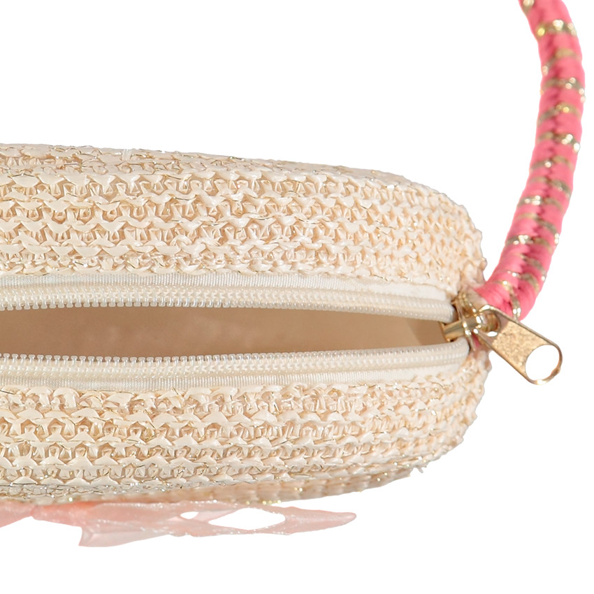 Sac en paille rond avec bandoulière en corde rose et dorée  