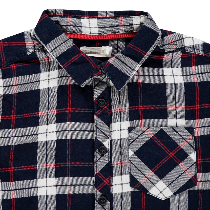 Chemise manches longues à carreaux et poche 