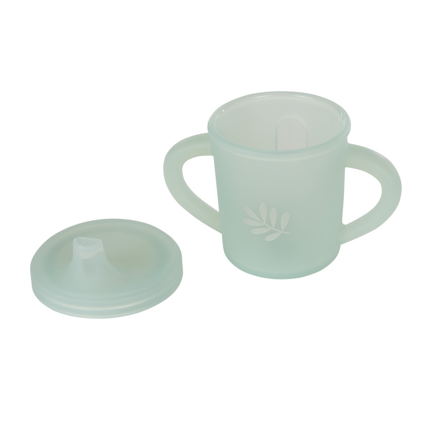 Tasse à bec avec anses latérales et motif feuillage 